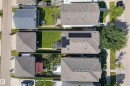 Aerial view showcasing multiple residential properties with shingled roofs and green spaces - 3003 20 Avenue Nw, Edmonton, AB  - Outdoor 