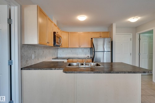 #430 4309 33 St, Stony Plain, AB - Indoor Photo Showing Kitchen With Double Sink