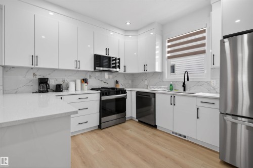 10915 159 Street Nw, Edmonton, AB - Indoor Photo Showing Kitchen With Upgraded Kitchen