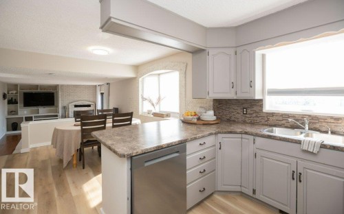 10737 108A Avenue, Westlock, AB - Indoor Photo Showing Kitchen With Double Sink