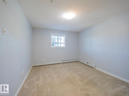 #216 392 Silverberry Road Nw, Edmonton, AB - Indoor Photo Showing Other Room