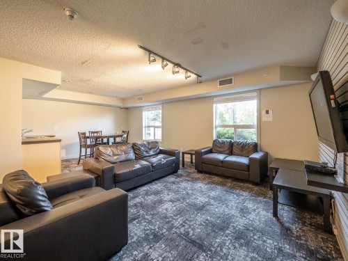 #216 392 Silverberry Road Nw, Edmonton, AB - Indoor Photo Showing Living Room
