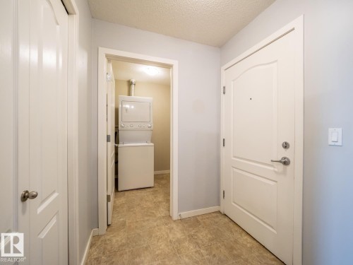 #216 392 Silverberry Road Nw, Edmonton, AB - Indoor Photo Showing Laundry Room