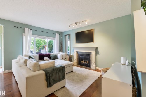 1375 113 Street Sw, Edmonton, AB - Indoor Photo Showing Living Room With Fireplace