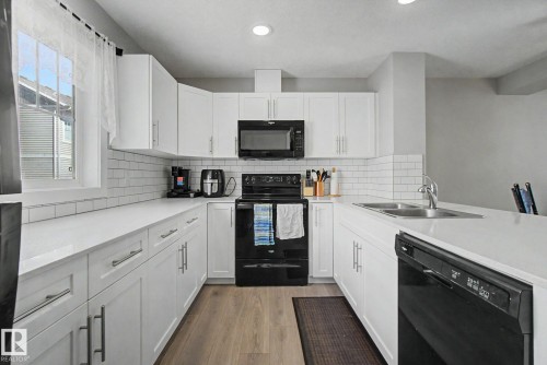 #90 17832 78 St Nw, Edmonton, AB - Indoor Photo Showing Kitchen With Double Sink