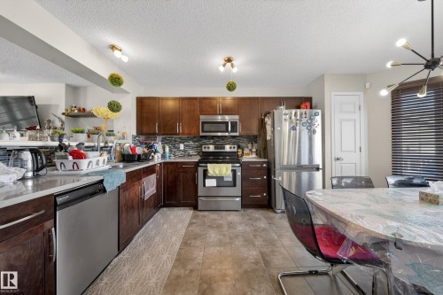4680 Crabapple Run Run Sw, Edmonton, AB - Indoor Photo Showing Kitchen With Double Sink