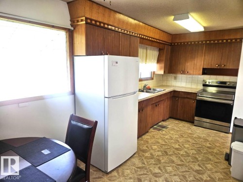 5024 50 Street, Andrew, AB - Indoor Photo Showing Kitchen With Double Sink