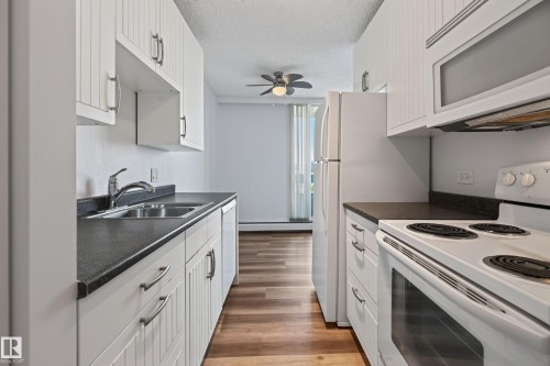#1507 10883 Saskatchewan Dr Nw, Edmonton, AB - Indoor Photo Showing Kitchen With Double Sink