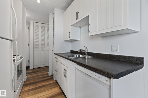 #1507 10883 Saskatchewan Dr Nw, Edmonton, AB - Indoor Photo Showing Kitchen With Double Sink