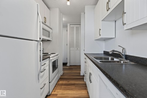 #1507 10883 Saskatchewan Dr Nw, Edmonton, AB - Indoor Photo Showing Kitchen With Double Sink