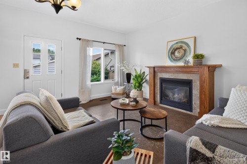 10640 79 Street Nw, Edmonton, AB - Indoor Photo Showing Living Room With Fireplace