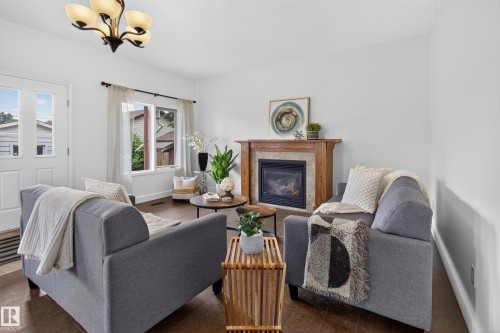 10640 79 Street Nw, Edmonton, AB - Indoor Photo Showing Living Room With Fireplace