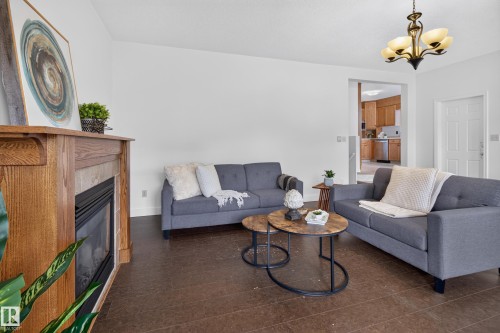 10640 79 Street Nw, Edmonton, AB - Indoor Photo Showing Living Room With Fireplace
