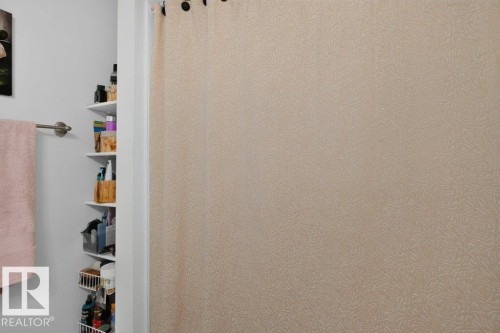 Built-in shelving for organized storage - 12219 89 Street Nw, Edmonton, AB - 
