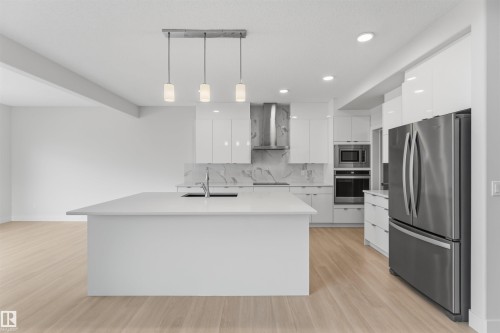15632 16 Avenue Sw, Edmonton, AB - Indoor Photo Showing Kitchen With Stainless Steel Kitchen With Upgraded Kitchen
