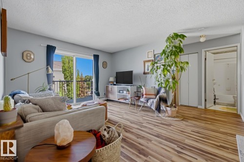 #428 2520 50 St Nw, Edmonton, AB - Indoor Photo Showing Living Room