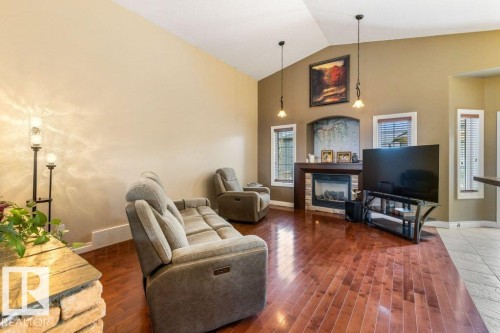 10107 97 Street, Morinville, AB - Indoor Photo Showing Living Room With Fireplace