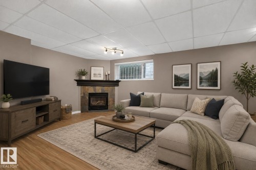 387 Foxboro Way, Sherwood Park, AB - Indoor Photo Showing Living Room With Fireplace