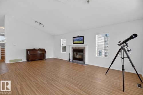 387 Foxboro Way, Sherwood Park, AB - Indoor Photo Showing Living Room With Fireplace