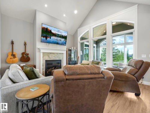 1A 53521 Rge Rd 272, Rural Parkland County, AB - Indoor Photo Showing Living Room With Fireplace