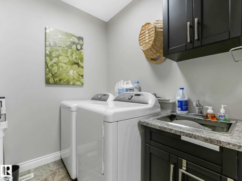 1A 53521 Rge Rd 272, Rural Parkland County, AB - Indoor Photo Showing Laundry Room