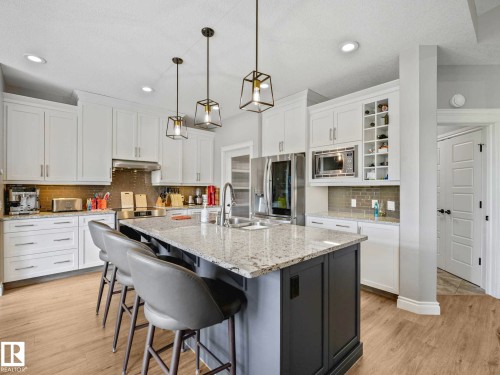 1A 53521 Rge Rd 272, Rural Parkland County, AB - Indoor Photo Showing Kitchen With Double Sink With Upgraded Kitchen