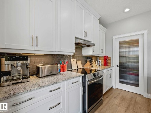 1A 53521 Rge Rd 272, Rural Parkland County, AB - Indoor Photo Showing Kitchen With Upgraded Kitchen