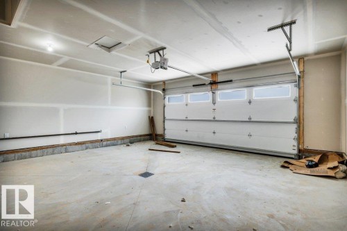 21 Norwyck Way, Spruce Grove, AB - Indoor Photo Showing Garage