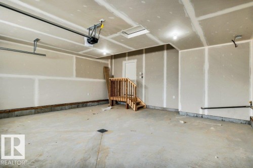 21 Norwyck Way, Spruce Grove, AB - Indoor Photo Showing Garage