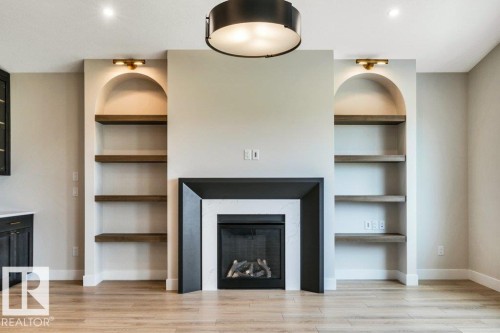 21 Norwyck Way, Spruce Grove, AB - Indoor Photo Showing Other Room With Fireplace