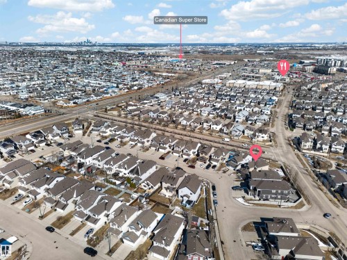 Expansive aerial perspective showcasing a residential neighborhood with diverse housing styles - 3639 15A Street Nw, Edmonton, AB - Outdoor With View
