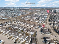Expansive aerial perspective showcasing a residential neighborhood with diverse housing styles - 