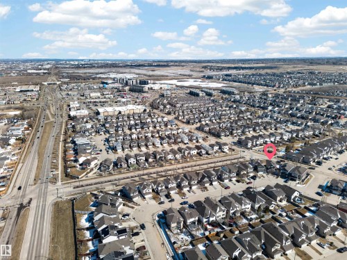 Aerial view showcasing a residential neighborhood with numerous detached homes and townhomes - 3639 15A Street Nw, Edmonton, AB - Outdoor With View