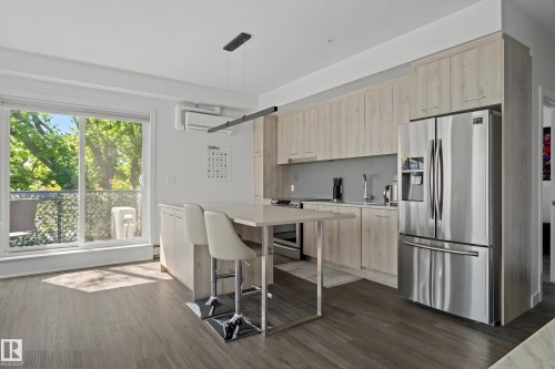 #408 10837 83 Av Nw, Edmonton, AB - Indoor Photo Showing Kitchen With Stainless Steel Kitchen