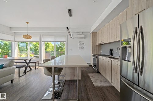 #408 10837 83 Av Nw, Edmonton, AB - Indoor Photo Showing Kitchen With Stainless Steel Kitchen
