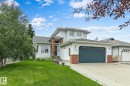 Two-story exterior with light-colored siding and brick accents - 385 Meadowview Terrace, Sherwood Park, AB  - Outdoor With Facade 