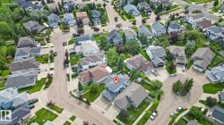 Aerial perspective showcasing a residential neighborhood with varied architectural styles - 