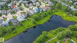 Aerial perspective showing the location of the home in the neighborhood and proximity to Clarkdale Meadows Pond - 