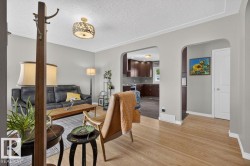 Light wood-finish flooring throughout the main living areas - 