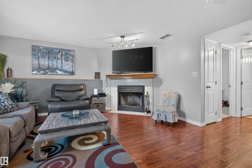 19 Desmarais Crescent, St. Albert, AB - Indoor Photo Showing Living Room With Fireplace