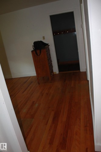 Hardwood flooring throughout the space - 5227 51 Street, Redwater, AB - Indoor Photo Showing Other Room