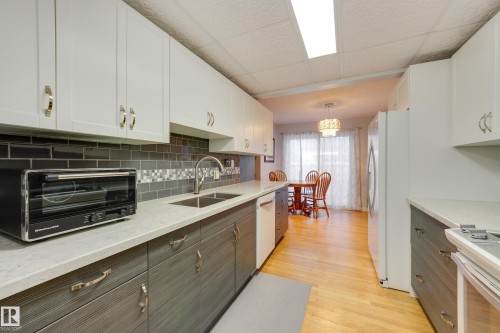 4303 46 Street, Stony Plain, AB - Indoor Photo Showing Kitchen With Double Sink
