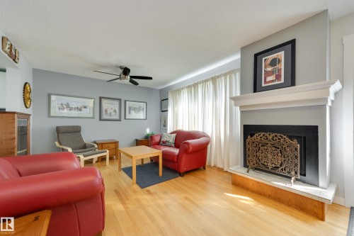 4303 46 Street, Stony Plain, AB - Indoor Photo Showing Living Room With Fireplace