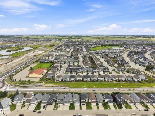Expansive aerial showcasing a residential development with numerous single-family homes - 6320 166 Avenue Nw, Edmonton, AB - Outdoor With View