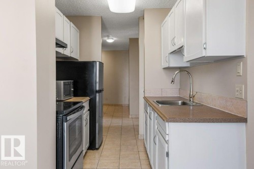 #1803 10883 Saskatchewan Dr Nw, Edmonton, AB - Indoor Photo Showing Kitchen