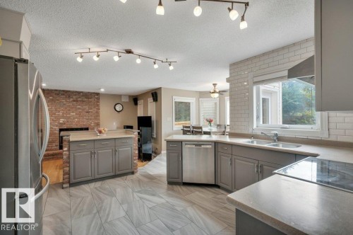 568 Buchanan Road Nw, Edmonton, AB - Indoor Photo Showing Kitchen With Double Sink