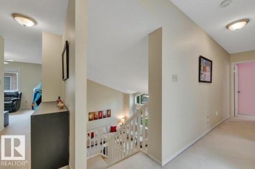 leading to the three bedrooms and loft area - 568 Buchanan Road Nw, Edmonton, AB - Indoor Photo Showing Other Room