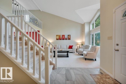 Entryway featuring a grand staircase. - 568 Buchanan Road Nw, Edmonton, AB - Indoor Photo Showing Other Room