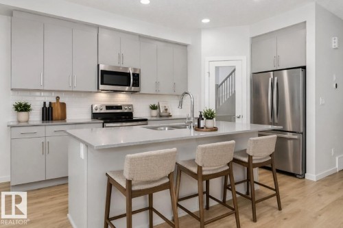 2735 6 Avenue Sw, Edmonton, AB - Indoor Photo Showing Kitchen With Double Sink With Upgraded Kitchen