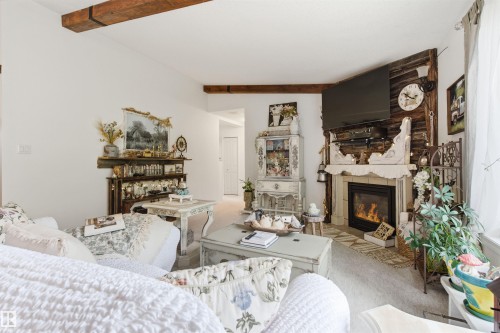 #116 59526 Hwy 657, Rural Bonnyville M.D., AB - Indoor Photo Showing Living Room With Fireplace